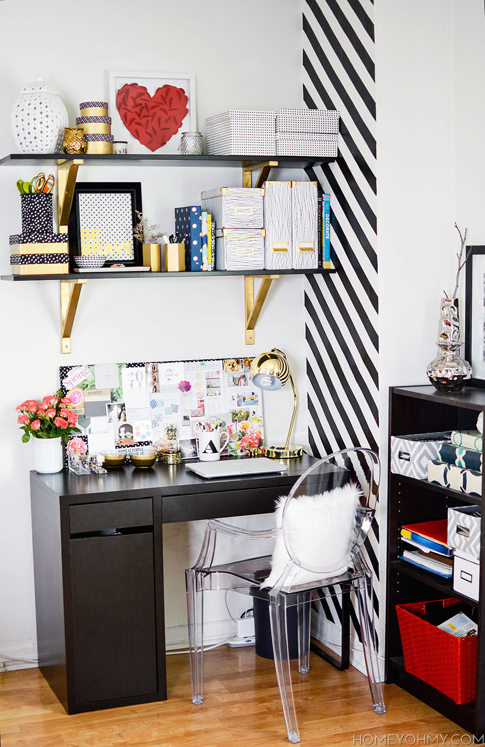 Gorgeous small workspace with black and gold accents