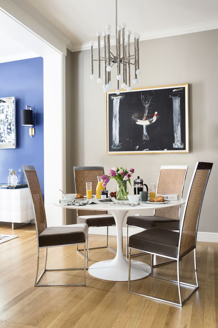 Glam dining room with tulip table