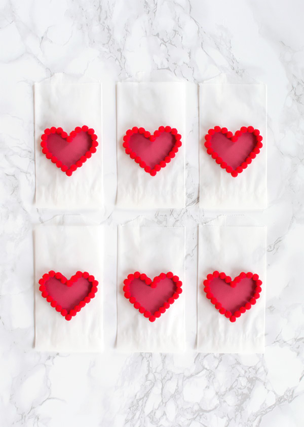 DIY Valentines Day Pom Pom Heart Treat Bags